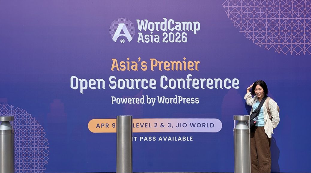 WordCamp Asia2026の会場入口にあったパネルの前で記念撮影